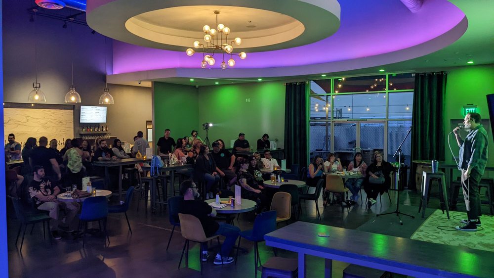 hilarious man commands respect at open mic night.